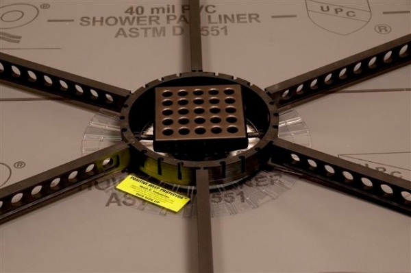 Как сделать сливной трап в душевой Как сделать сливной трап в душевой